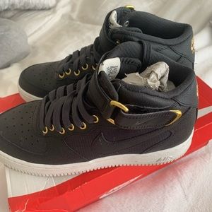 Black high top sneakers